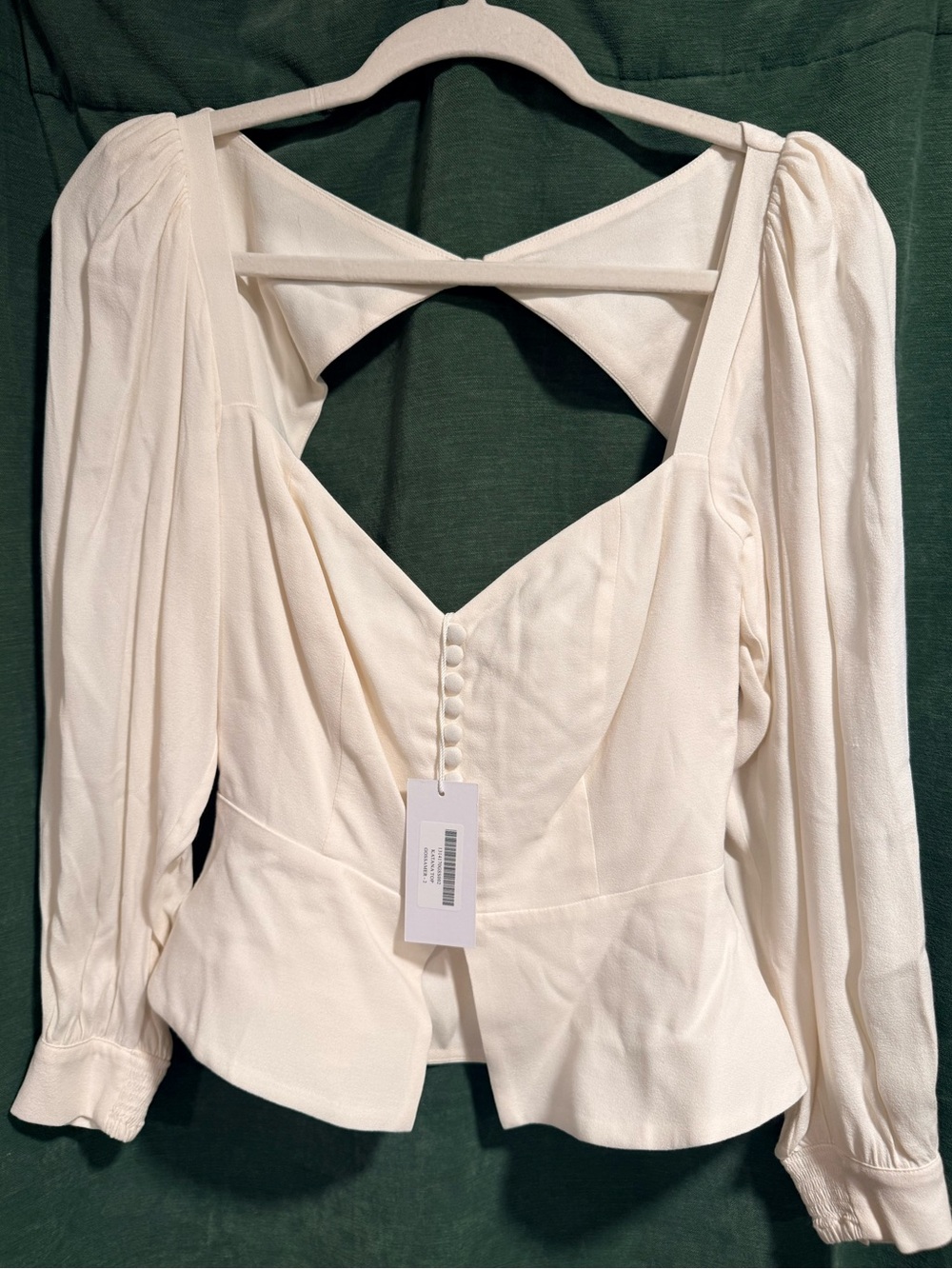 Reformation Ivory Peplum Long-Sleeve Top with Back Cutout